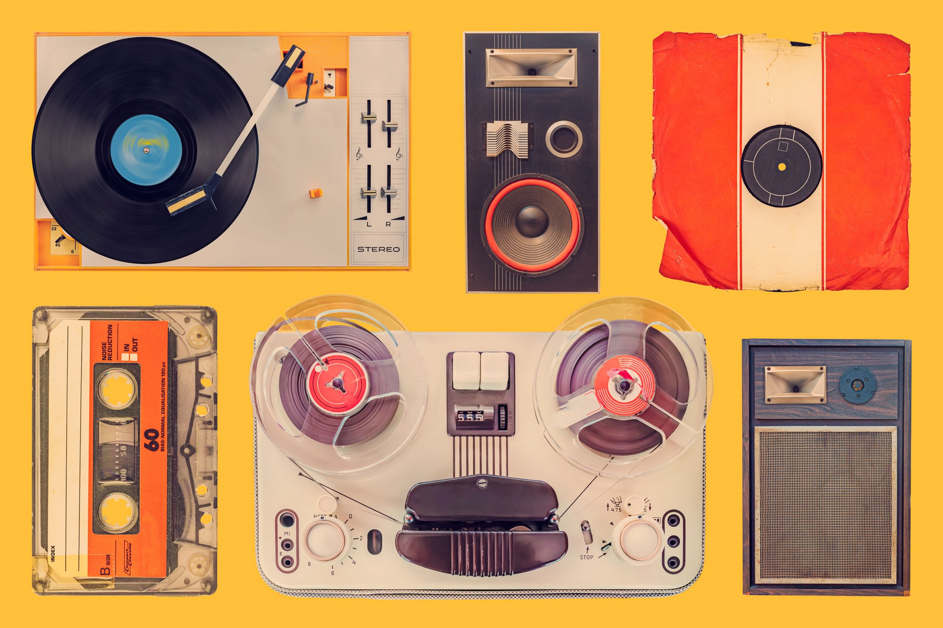 Collection of a vintage turntable, speakers, record, compact cassette and tape recorder Collection of a vintage turntable, speakers, record, compact cassette and tape recorder